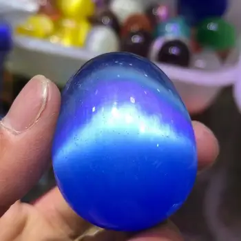 Natūralios mėlynos katės akies kristalų kiaušinių būrimą energijos akmuo fotografijos kiaušinių dekoravimas